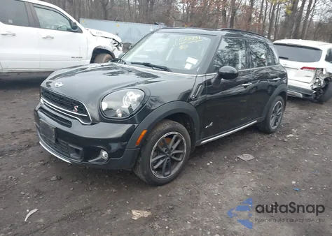 2015 Mini Countryman Cooper S z USA, uszkodzony, nr VIN WMWZC5C5XFWP47658